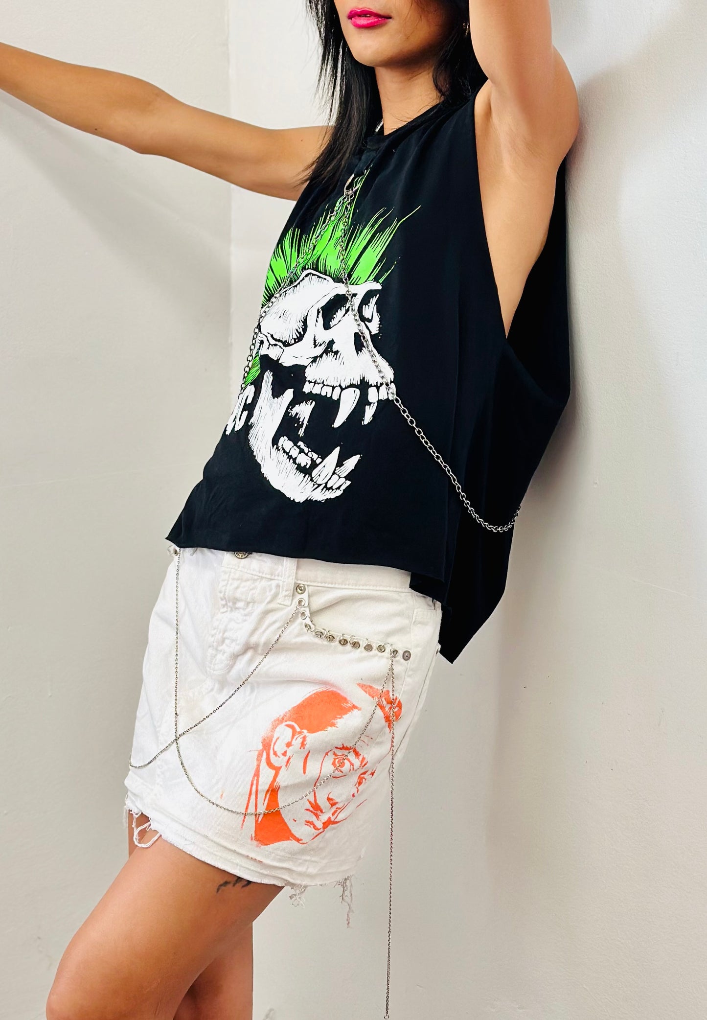 Reworked denim Mini skirt with screen print/ chains